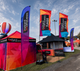 Don’t Let Autumn Showers Wash Out Your Brand: The Power of Branded Gazebos, Flags, and Banners