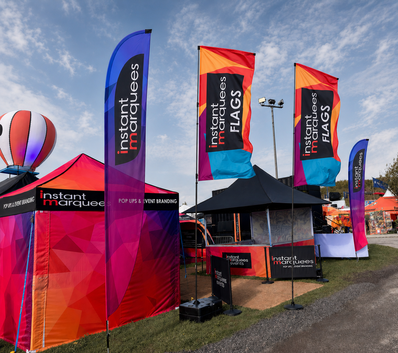 Don’t Let Autumn Showers Wash Out Your Brand: The Power of Branded Gazebos, Flags, and Banners